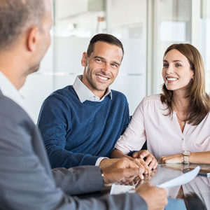 couple meeting with a debt relief expert