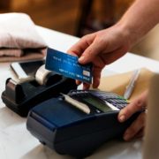 person making a purchase with a credit card